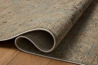 Finished in breezy sky-blue and lush moss tones with contemporary and traditional styling, the Briar BRR-01 Sky / Moss Area Rug is a power-loomed polyester area rug for modern living