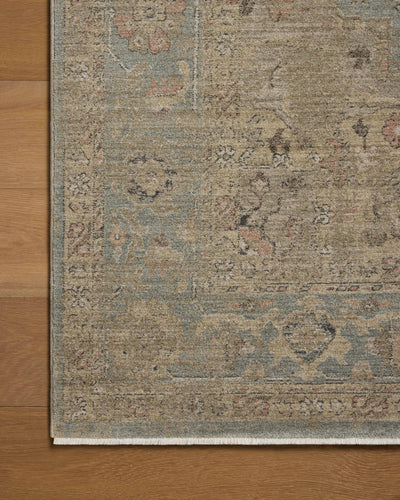 Finished in breezy sky-blue and lush moss tones with contemporary and traditional styling, the Briar BRR-01 Sky / Moss Area Rug is a power-loomed polyester area rug for modern living