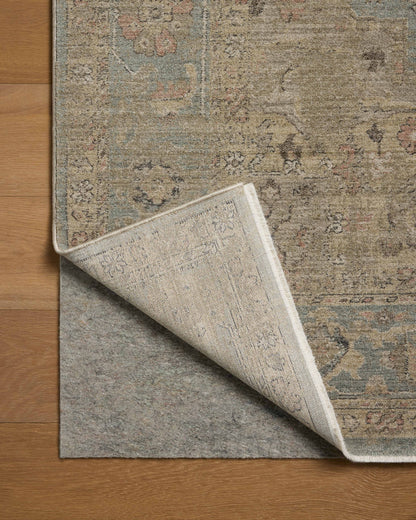 Finished in breezy sky-blue and lush moss tones with contemporary and traditional styling, the Briar BRR-01 Sky / Moss Area Rug is a power-loomed polyester area rug for modern living
