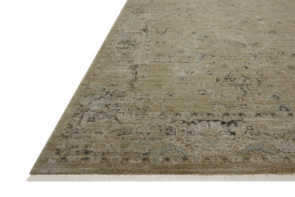 Dressed in earthy olive and grounding stone hues with contemporary and traditional detail, the Briar BRR-02 Olive / Stone Area Rug is a power-loomed polyester area rug that completes any room