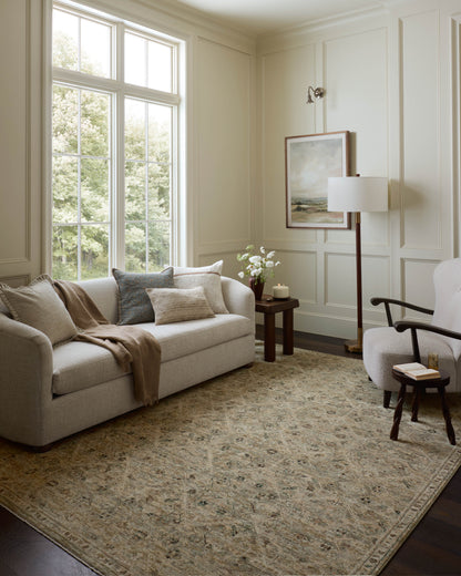 The Briar BRR-03 Silver / Moss Area Rug transforms any space with shimmering silver and lush moss tones and contemporary and traditional design in a power-loomed polyester area rug