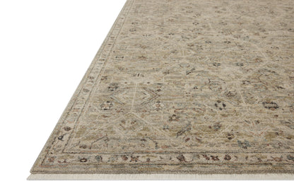 The Briar BRR-03 Silver / Moss Area Rug transforms any space with shimmering silver and lush moss tones and contemporary and traditional design in a power-loomed polyester area rug