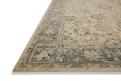 The Briar BRR-05 Ant. Ivory / Blue Area Rug is a power-loomed polyester area rug that radiates ant. ivory and calming blue charm and contemporary and traditional elegance