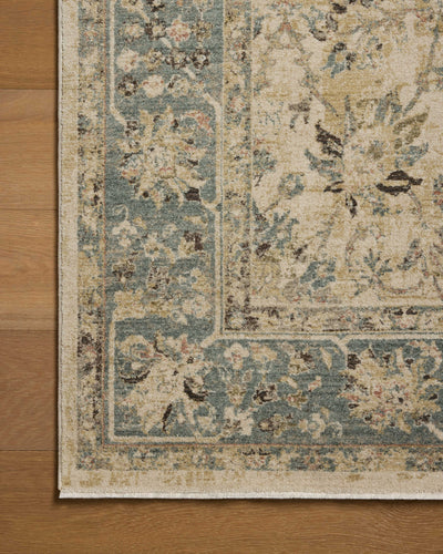 The Briar BRR-05 Ant. Ivory / Blue Area Rug is a power-loomed polyester area rug that radiates ant. ivory and calming blue charm and contemporary and traditional elegance