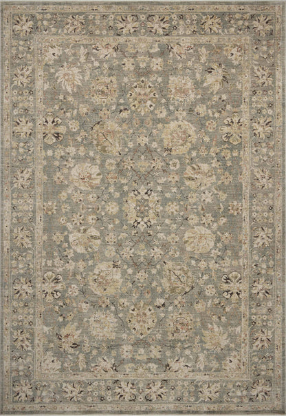 Layered in misty and sandy hues with contemporary and traditional patterns, the Briar BRR-05 Fog / Sand Area Rug is a power-loomed polyester area rug perfect for any setting