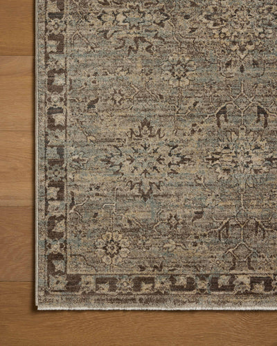 Featuring soft misty and striking granite hues and contemporary and traditional detail, the Briar BRR-06 Mist / Granite Area Rug is a power-loomed polyester area rug for any room