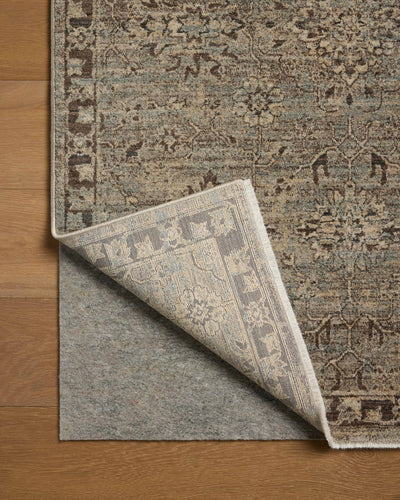 Featuring soft misty and striking granite hues and contemporary and traditional detail, the Briar BRR-06 Mist / Granite Area Rug is a power-loomed polyester area rug for any room