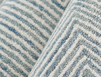 Close-up of the Charles CHR-1 Blue Area Rug showing its blue and white wool herringbone pattern.