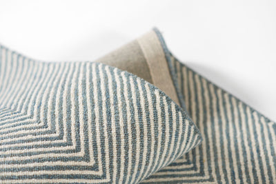 Close-up of the Charles CHR-1 Blue Area Rug showing its blue and white herringbone wool texture.