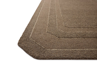 The Clayton CLN-01 Bark Area Rug transforms any space with grounded bark tones and traditional design in a hand-tufted wool area rug