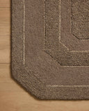 The Clayton CLN-01 Bark Area Rug transforms any space with grounded bark tones and traditional design in a hand-tufted wool area rug