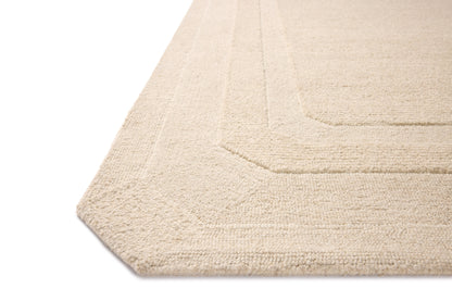 Layered in cozy oatmeal hues with traditional patterns, the Clayton CLN-01 Oatmeal Area Rug is a hand-tufted wool area rug perfect for any setting