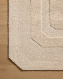 Layered in cozy oatmeal hues with traditional patterns, the Clayton CLN-01 Oatmeal Area Rug is a hand-tufted wool area rug perfect for any setting
