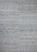 The Cline CLI-01 Sky Area Rug blends breezy sky-blue tones into a hand-woven 100% wool area rug with timeless appeal