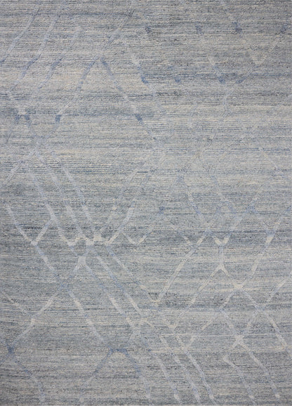 The Cline CLI-01 Sky Area Rug blends breezy sky-blue tones into a hand-woven 100% wool area rug with timeless appeal