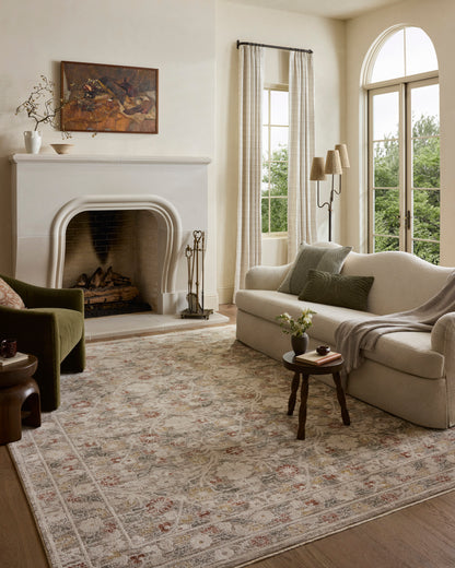 The Clarisse CLS-01 Grey / Multi Area Rug offers elegant grey and vibrant multi-toned sophistication and traditional and floral charm in a power-loomed polyester area rug