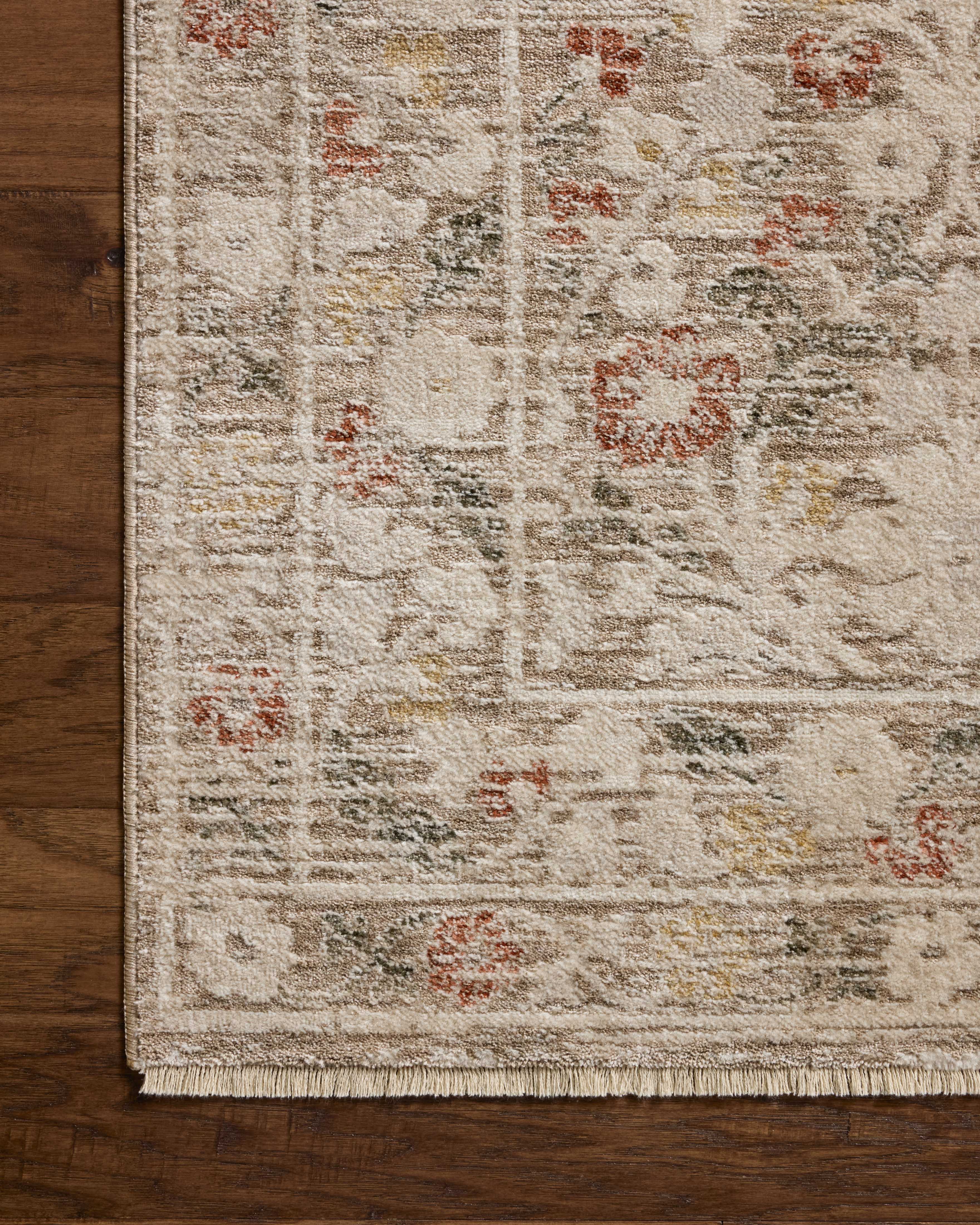 The Clarisse CLS-01 Grey / Multi Area Rug offers elegant grey and vibrant multi-toned sophistication and traditional and floral charm in a power-loomed polyester area rug