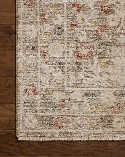 The Clarisse CLS-01 Grey / Multi Area Rug offers elegant grey and vibrant multi-toned sophistication and traditional and floral charm in a power-loomed polyester area rug