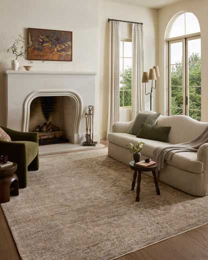The Clarisse CLS-02 Smoke / Natural Area Rug brings smoky and warm natural character and traditional and floral flair to your home in a power-loomed polyester area rug
