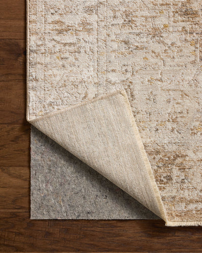 Finished in versatile taupe and gentle dove tones with traditional and floral styling, the Clarisse CLS-03 Taupe / Dove Area Rug is a power-loomed polyester area rug for modern living