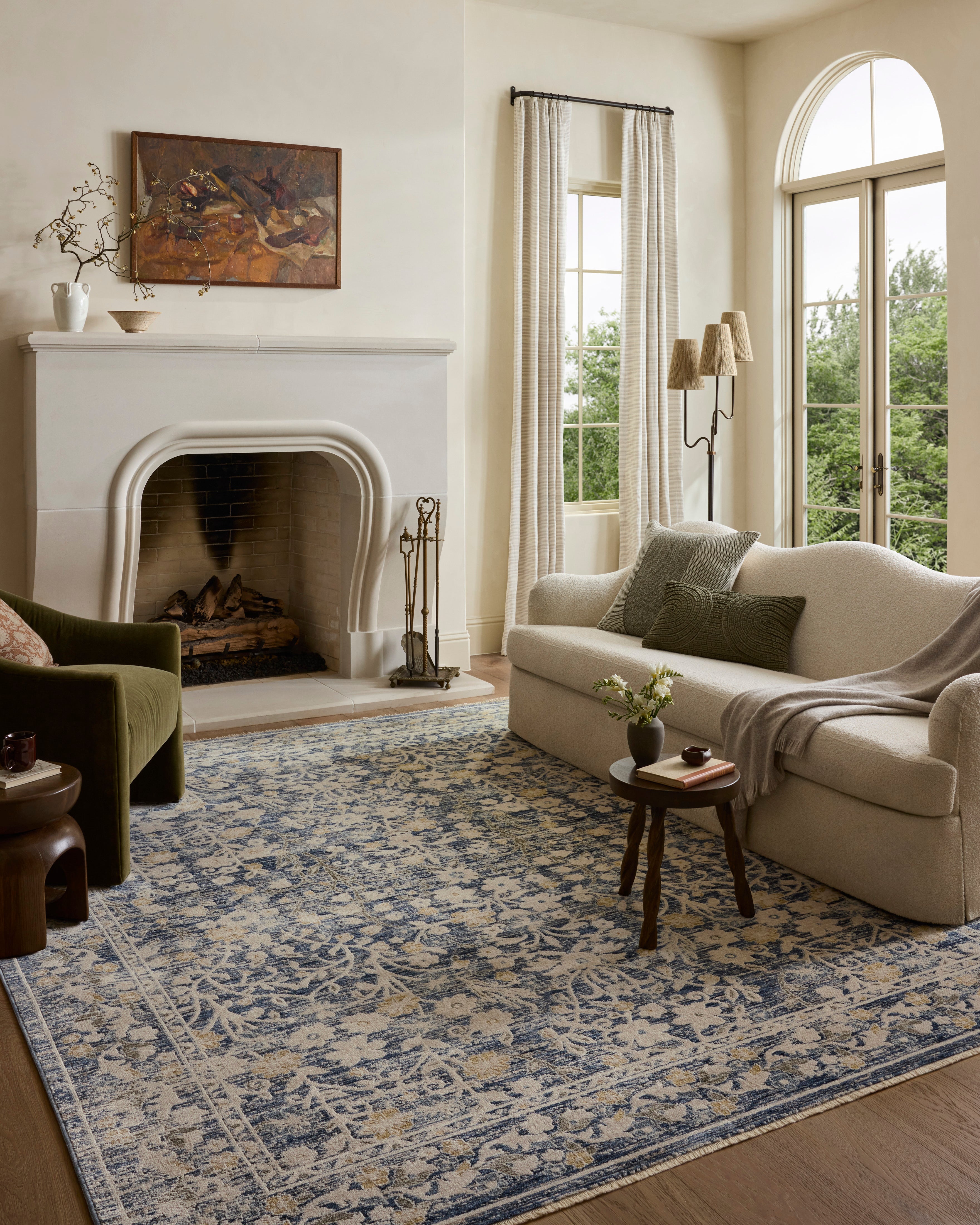A power-loomed polyester area rug with traditional and floral design in calming blue and warm beige hues, the Clarisse CLS-05 Blue / Beige Area Rug is a standout in any décor