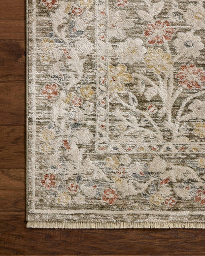 The Clarisse CLS-05 Olive / Multi Area Rug highlights earthy olive and vibrant multi-toned tones and traditional and floral texture in a beautifully made power-loomed polyester area rug