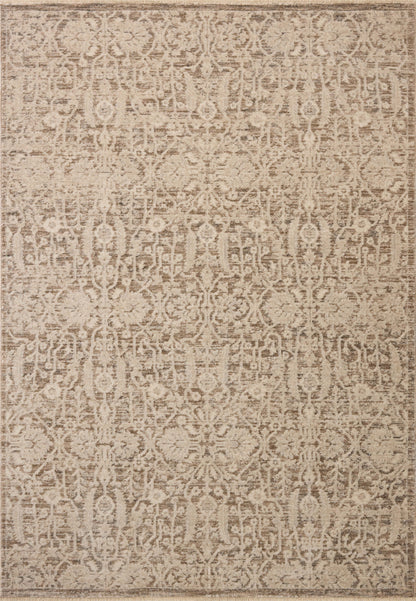 Dressed in misty and bone hues with traditional and floral detail, the Clarisse CLS-06 Fog / Bone Area Rug is a power-loomed polyester area rug that completes any room