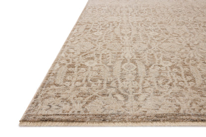 Dressed in misty and bone hues with traditional and floral detail, the Clarisse CLS-06 Fog / Bone Area Rug is a power-loomed polyester area rug that completes any room