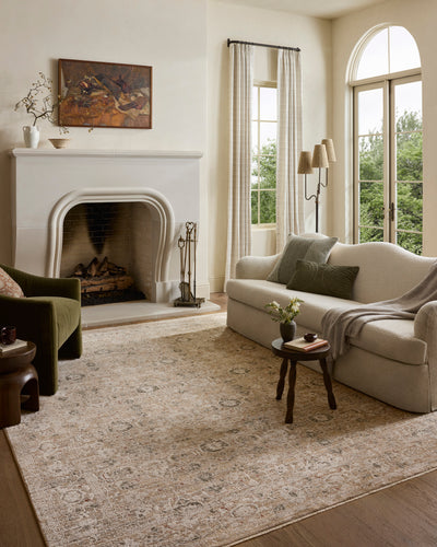 The Clarisse CLS-07 Natural / Granite Area Rug transforms any space with warm natural and striking granite tones and traditional and floral design in a power-loomed polyester area rug