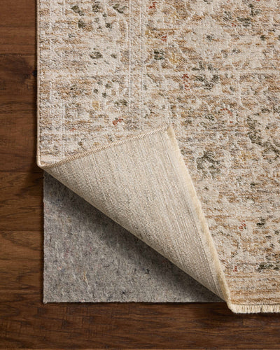 The Clarisse CLS-07 Natural / Granite Area Rug transforms any space with warm natural and striking granite tones and traditional and floral design in a power-loomed polyester area rug