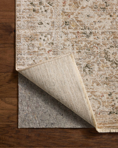 The Clarisse CLS-07 Natural / Granite Area Rug transforms any space with warm natural and striking granite tones and traditional and floral design in a power-loomed polyester area rug