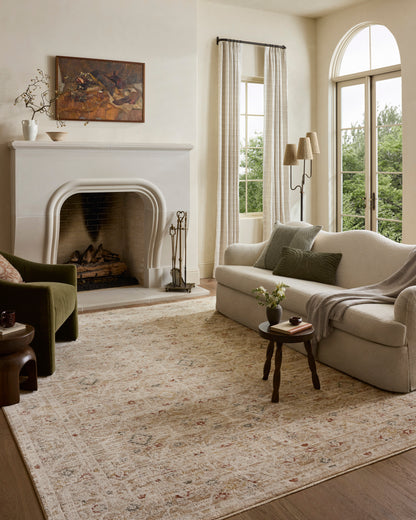 A power-loomed polyester area rug in warm natural and vibrant multi-toned tones with traditional and floral motifs, the Clarisse CLS-08 Natural / Multi Area Rug grounds your room beautifully
