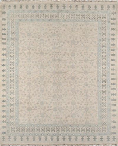 Erin Gates x Momeni ivory Concord Sudbury CRD-2 Sudbury area rug with subtle geometric patterns and distressed borders, featuring a hand-knotted wool blend design.