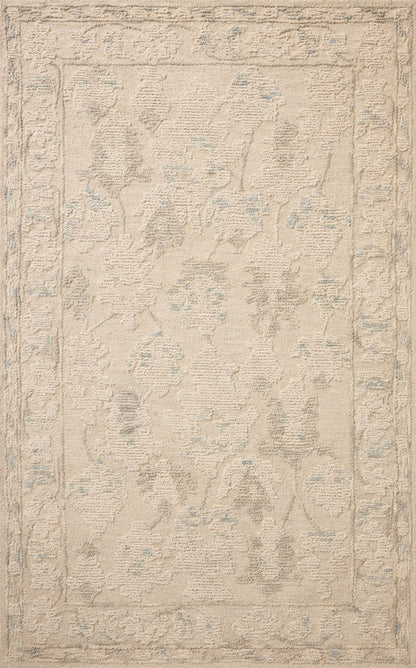 Featuring refined ivory and breezy sky-blue hues and floral detail, the Cynthia CYN-02 Ivory / Sky Area Rug is a hand-tufted wool area rug for any room