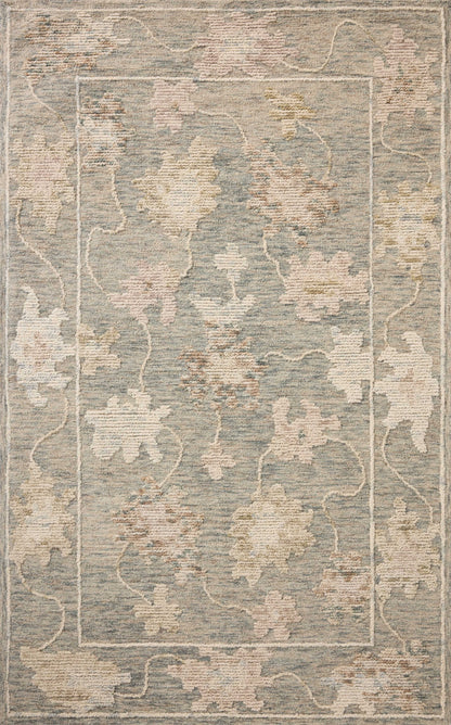 A hand-tufted wool area rug with floral flair in casual denim and calming blue tones, the Cynthia CYN-03 Denim / Blue Area Rug anchors any room