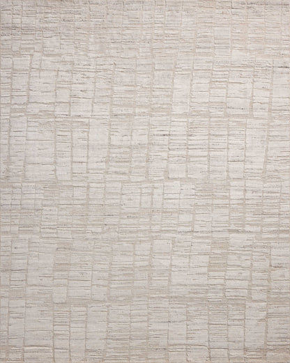 Rich in antique ivory hues with ribbed and graphic detail, the Daniel DAN-01 Antique Ivory Area Rug is a hand-loomed bamboo and wool area rug built for style and comfort