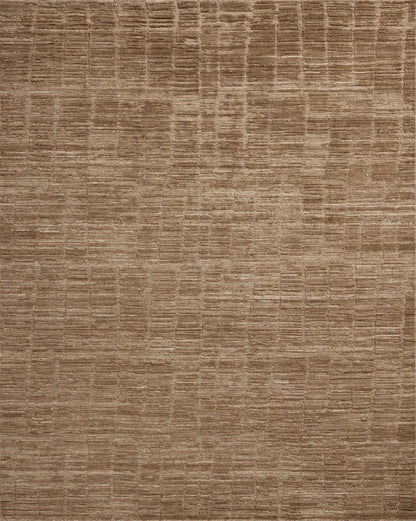 The Daniel DAN-01 Fawn Area Rug offers warm fawn sophistication and ribbed and graphic charm in a hand-loomed bamboo and wool area rug