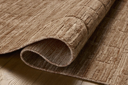 The Daniel DAN-01 Fawn Area Rug offers warm fawn sophistication and ribbed and graphic charm in a hand-loomed bamboo and wool area rug