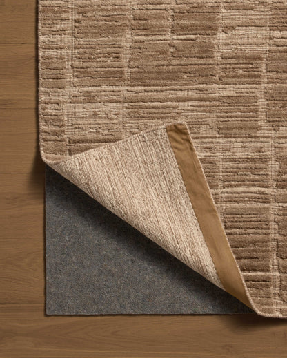 The Daniel DAN-01 Fawn Area Rug offers warm fawn sophistication and ribbed and graphic charm in a hand-loomed bamboo and wool area rug
