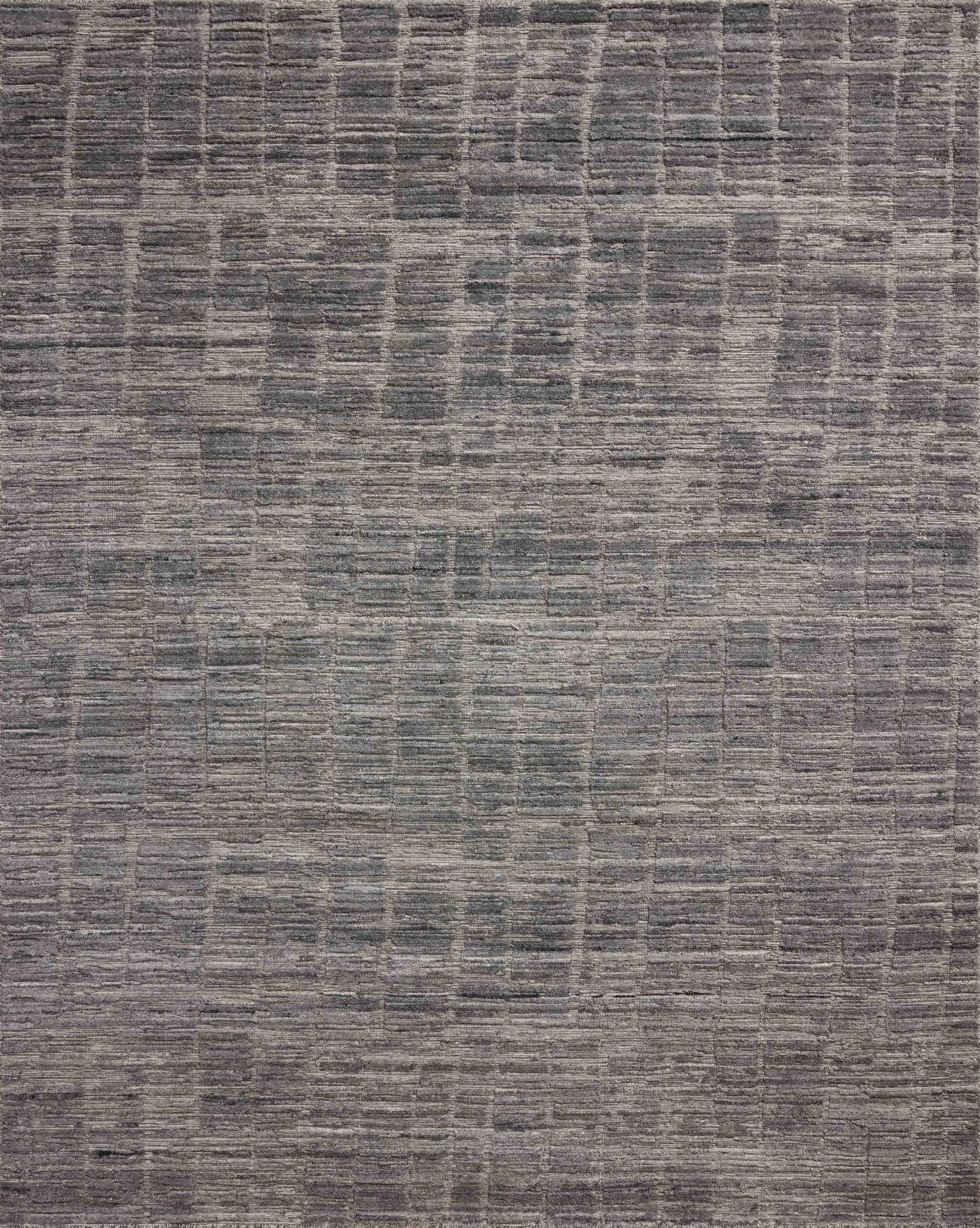 Expertly crafted as a hand-loomed bamboo and wool area rug with ribbed and graphic artistry, the Daniel DAN-01 Slate Area Rug captures cool slate tones beautifully