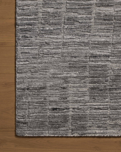 Expertly crafted as a hand-loomed bamboo and wool area rug with ribbed and graphic artistry, the Daniel DAN-01 Slate Area Rug captures cool slate tones beautifully