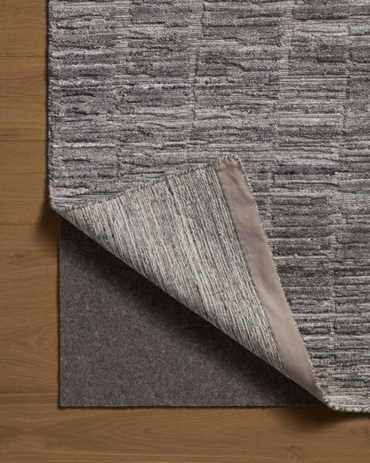 Expertly crafted as a hand-loomed bamboo and wool area rug with ribbed and graphic artistry, the Daniel DAN-01 Slate Area Rug captures cool slate tones beautifully