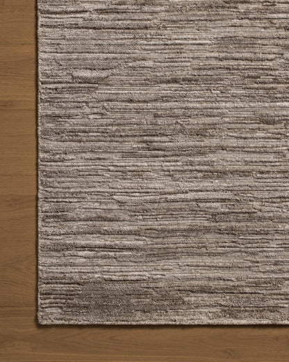 The Daniel DAN-02 Dove Area Rug brings gentle dove character and ribbed and graphic flair to your home in a hand-loomed bamboo and wool area rug