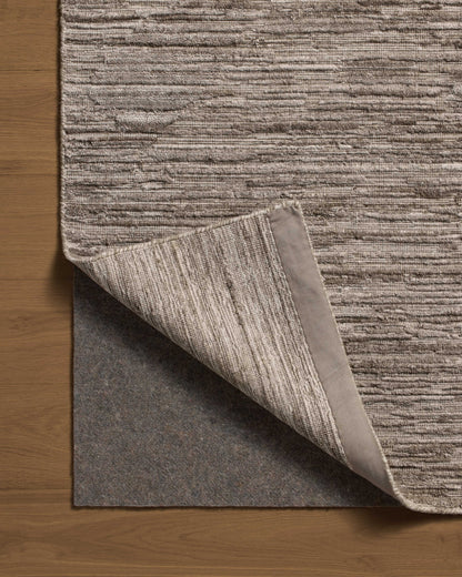 The Daniel DAN-02 Dove Area Rug brings gentle dove character and ribbed and graphic flair to your home in a hand-loomed bamboo and wool area rug