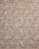 Finished in warm natural tones with ribbed and graphic styling, the Daniel DAN-02 Natural Area Rug is a hand-loomed bamboo and wool area rug for modern living
