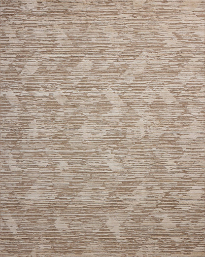 Finished in warm natural tones with ribbed and graphic styling, the Daniel DAN-02 Natural Area Rug is a hand-loomed bamboo and wool area rug for modern living