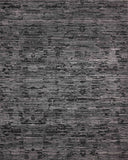 A hand-loomed bamboo and wool area rug with ribbed and graphic design in deep charcoal hues, the Daniel DAN-03 Charcoal Area Rug is a standout in any décor