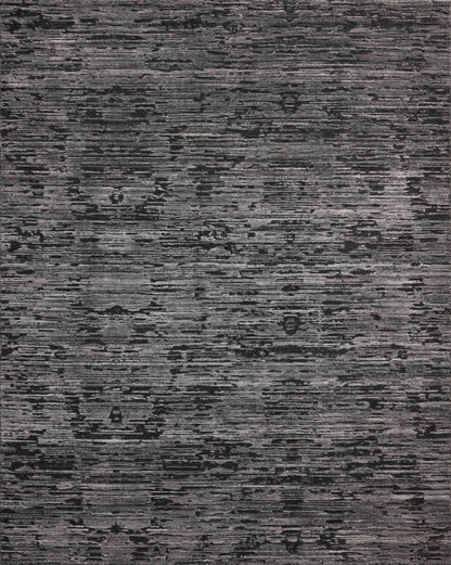 A hand-loomed bamboo and wool area rug with ribbed and graphic design in deep charcoal hues, the Daniel DAN-03 Charcoal Area Rug is a standout in any décor