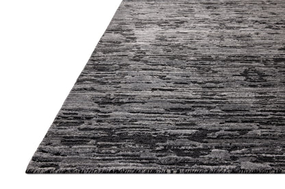 A hand-loomed bamboo and wool area rug with ribbed and graphic design in deep charcoal hues, the Daniel DAN-03 Charcoal Area Rug is a standout in any décor