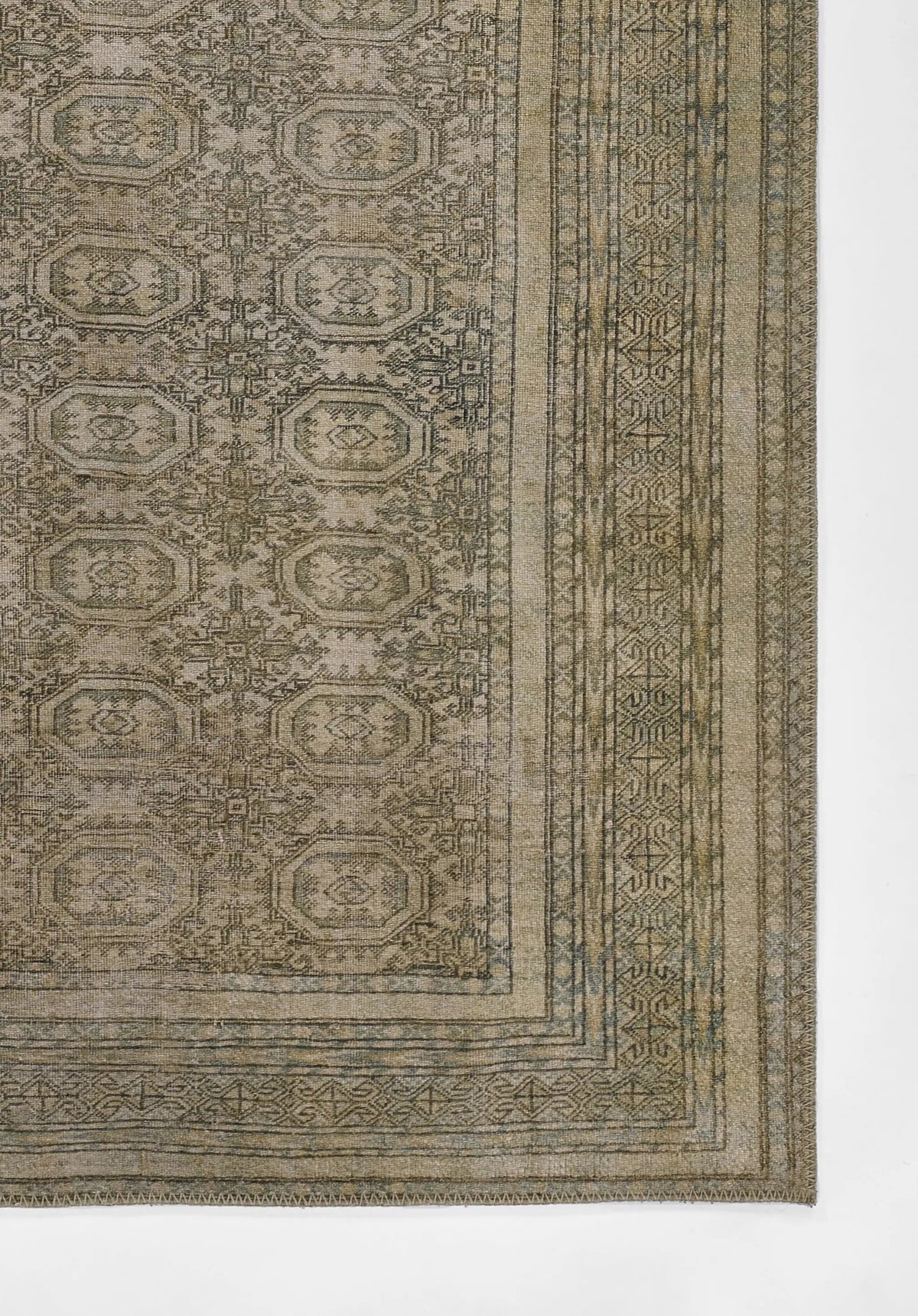 Erin Gates by Momeni Dorset DOR-1 Vintage green area rug featuring distressed octagonal (Bokhara) style medallions and intricate border detailing for curated antique elegance.